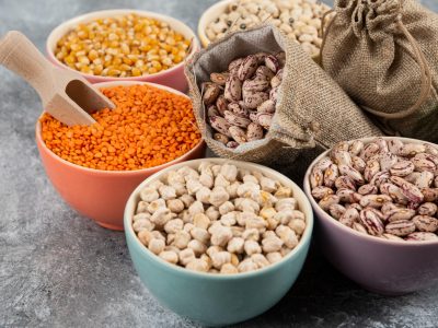 assortment-raw-dry-legumes-composition-marble-table-surface